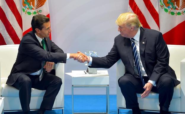 Trump insiste en que México pagará el muro antes de verse con Peña Nieto