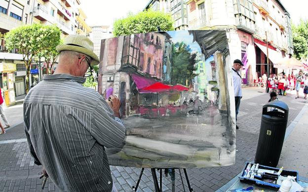 Paletas y pinceles en plena calle