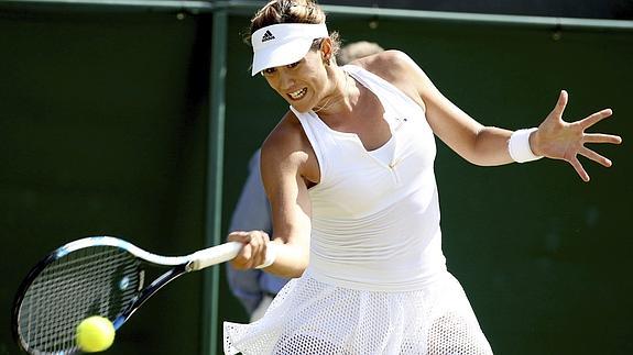 Muguruza agranda su figura al vencer a Wozniacki