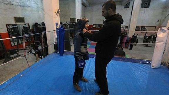 El boxeo, un oasis de normalidad en la guerra que desangra Siria