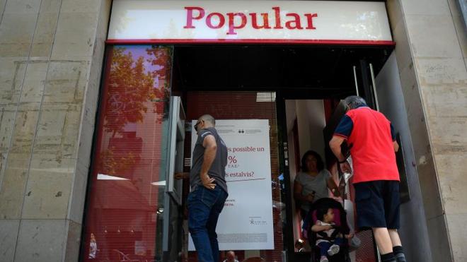 Competencia vigilará los efectos de la compra del Popular