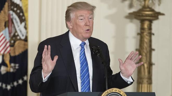 La Corte Suprema de EE UU permite parcialmente el decreto migratorio de Trump