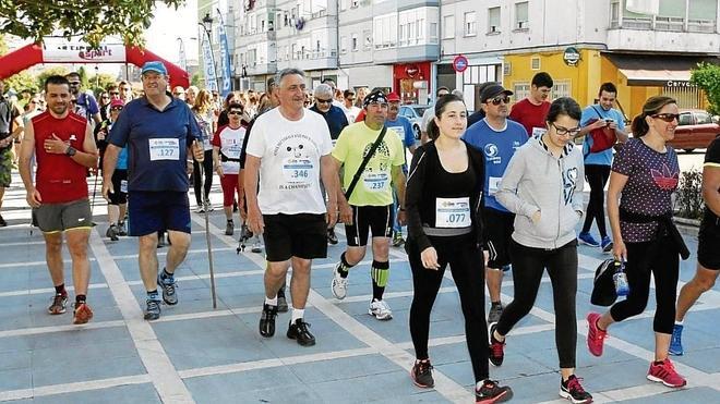 Marcha solidaria y ecologista en el Barrio Covadonga